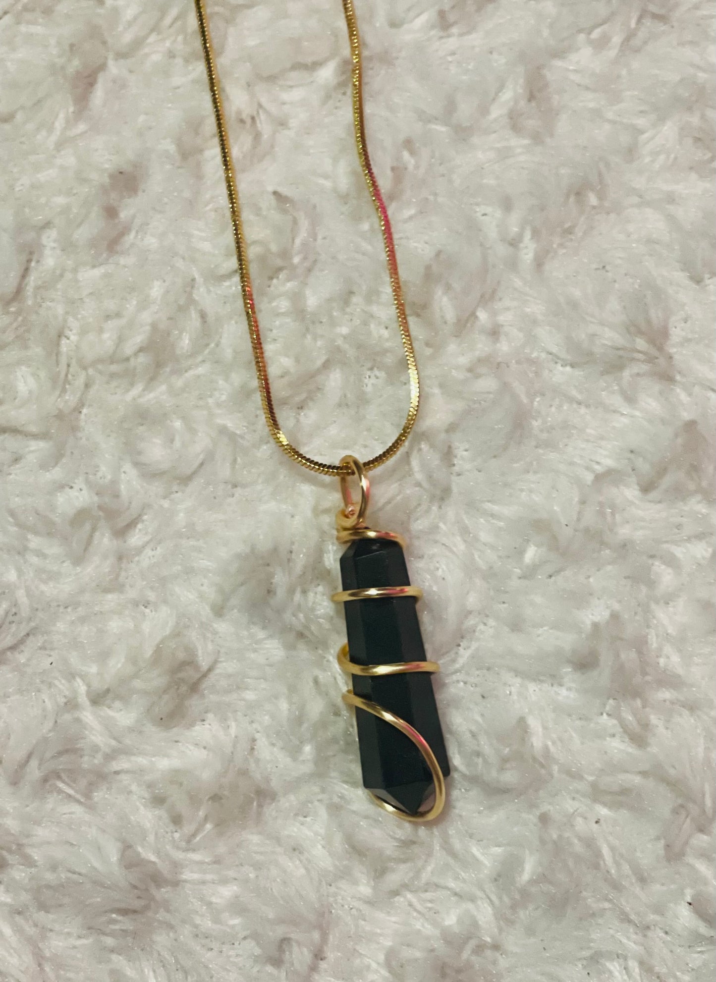 Obsidian pendants