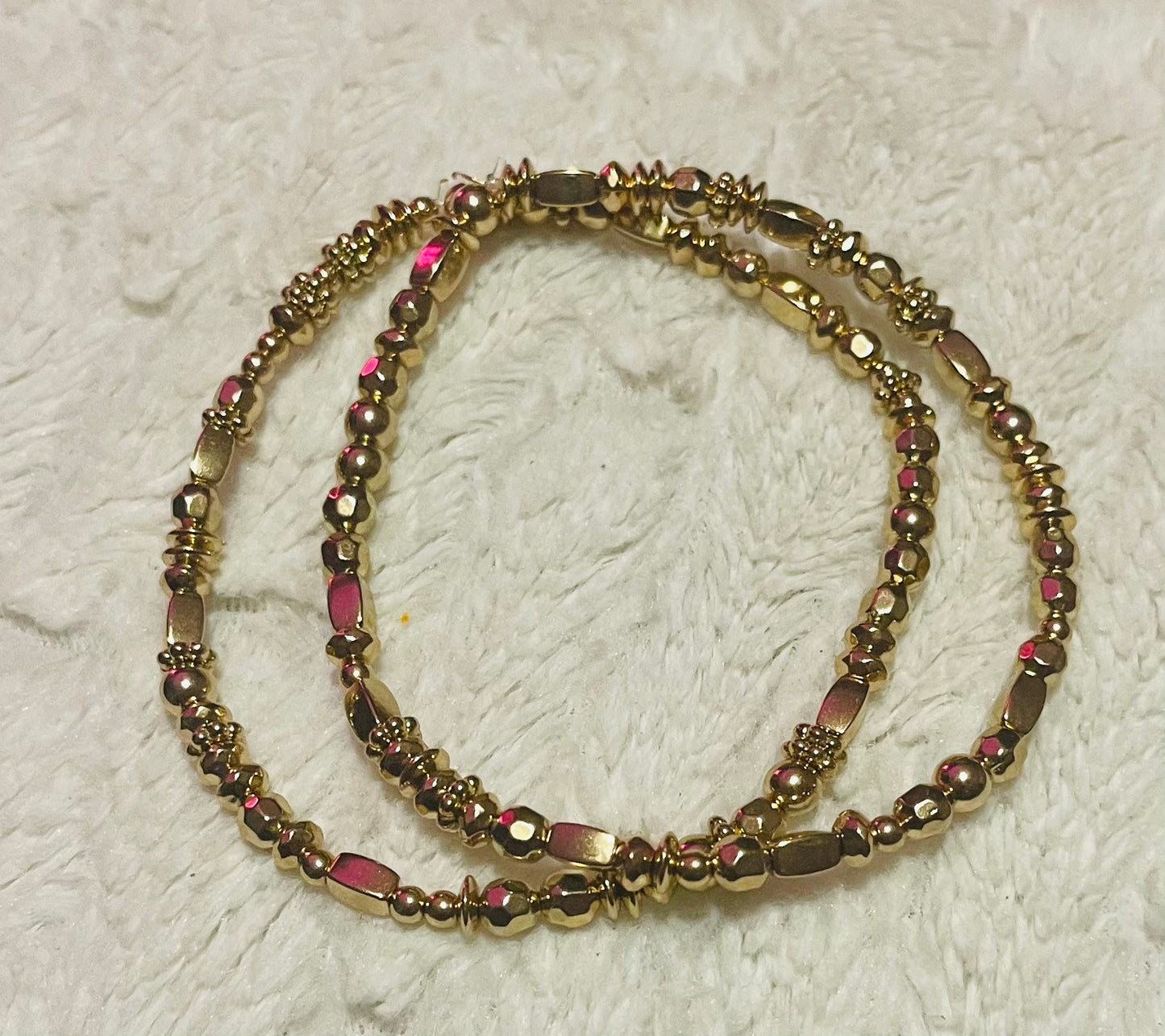 Gold beaded anklet stack