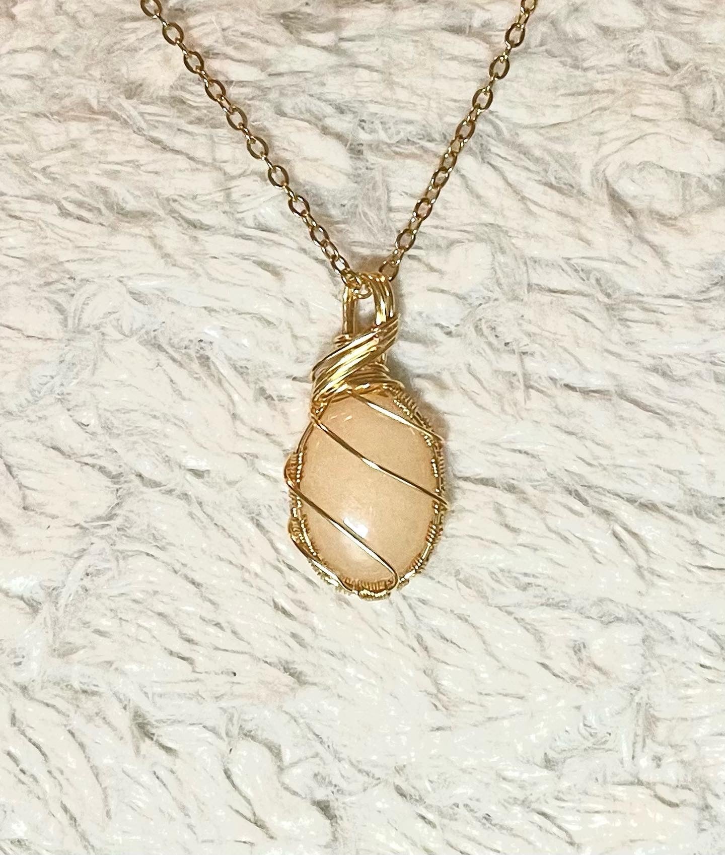 Yellow Calcite wrapped in gold